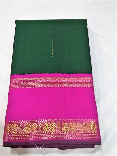 17129 Pure Silk Double Pet, Raindrops butta, Bottle Green body with rose pallu and border with blouse