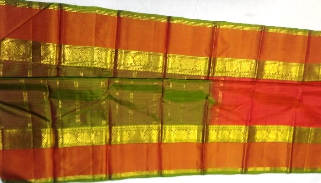 17245 Pure Silk Double Pet Annapakshi border Brown-Green Mix border with Rust body