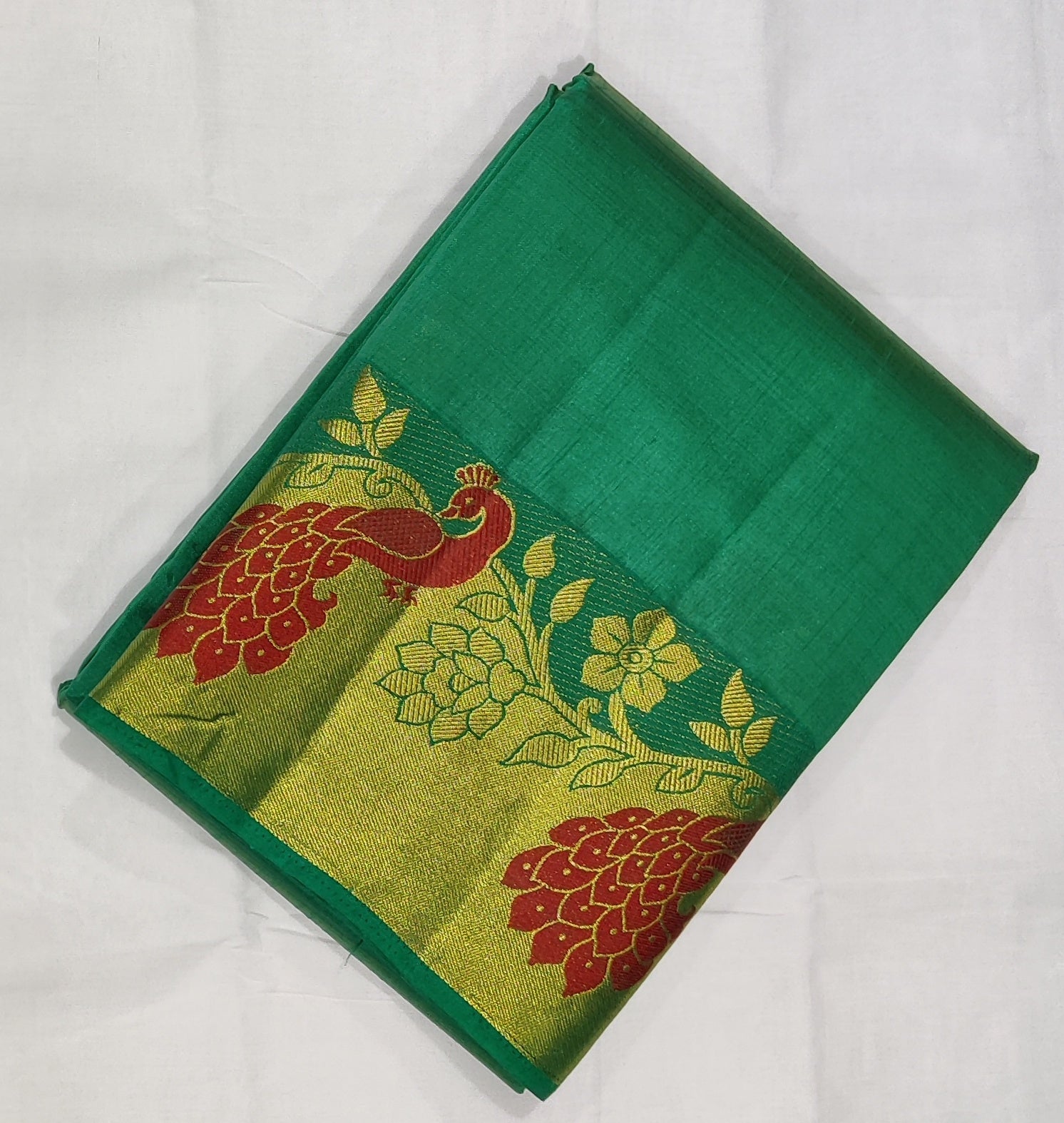 33368 Semi Raw Silk Saree with Big Peacock embossed Zari Border and Green Body Color