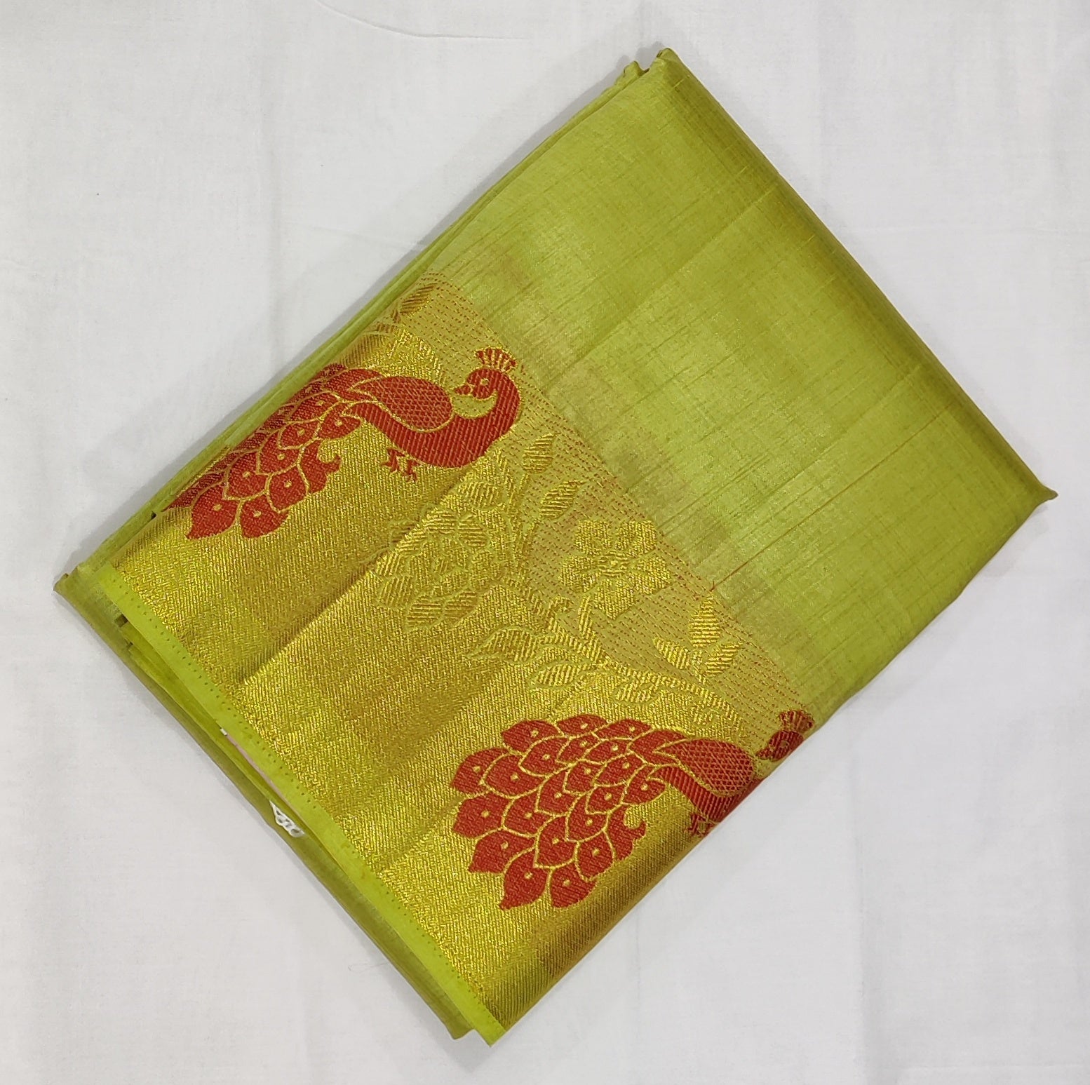 33371 Semi Raw Silk Saree with Big Peacock embossed Zari Border and Pista Green Body Color