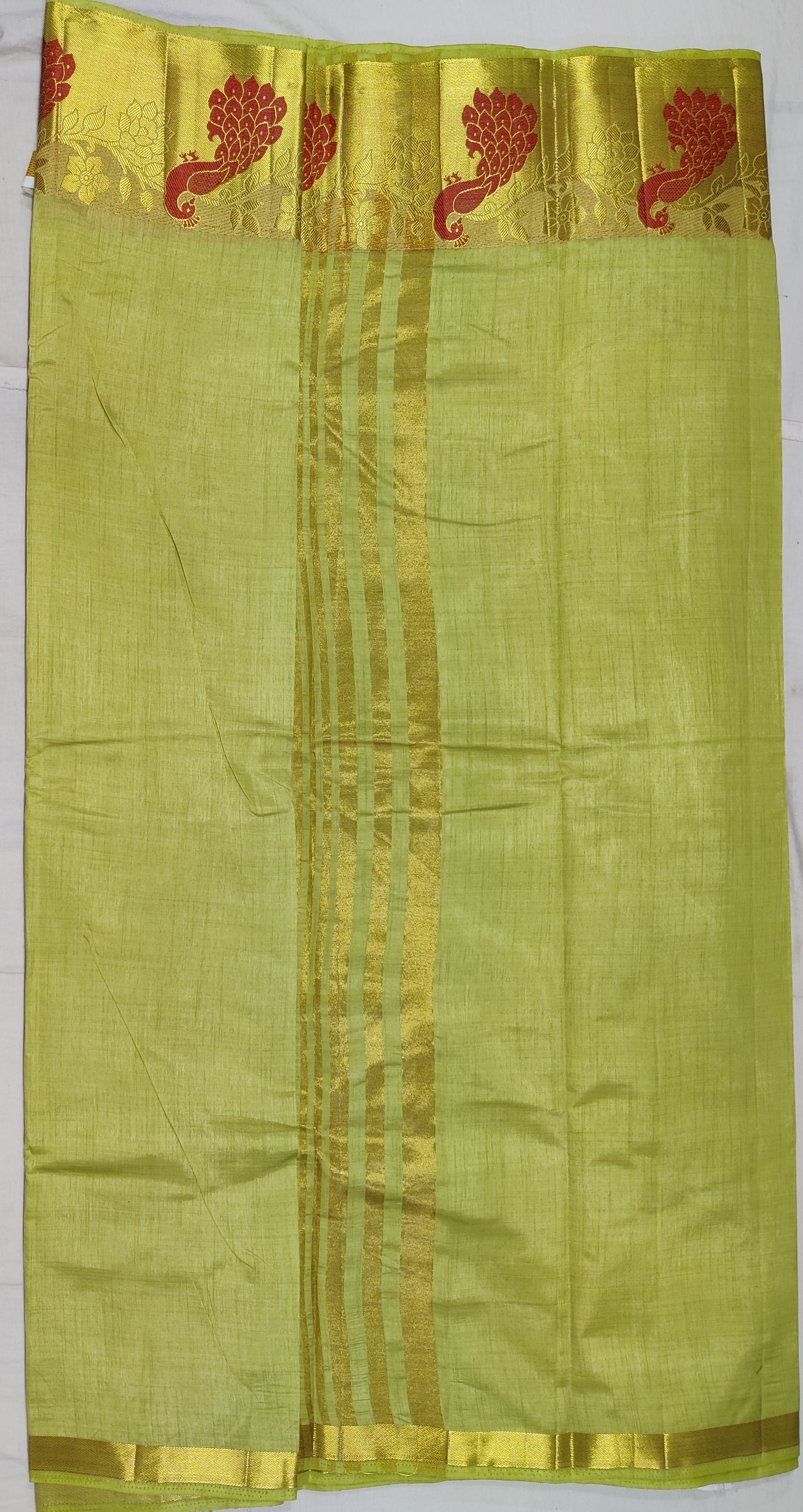 33371 Semi Raw Silk Saree with Big Peacock embossed Zari Border and Pista Green Body Color