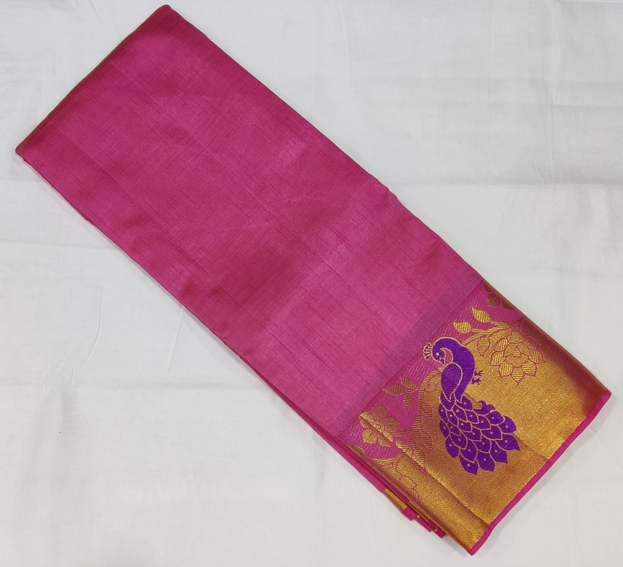 33367 Semi Raw Silk Saree with Big Peacock embossed Zari Border and Pink Body Color